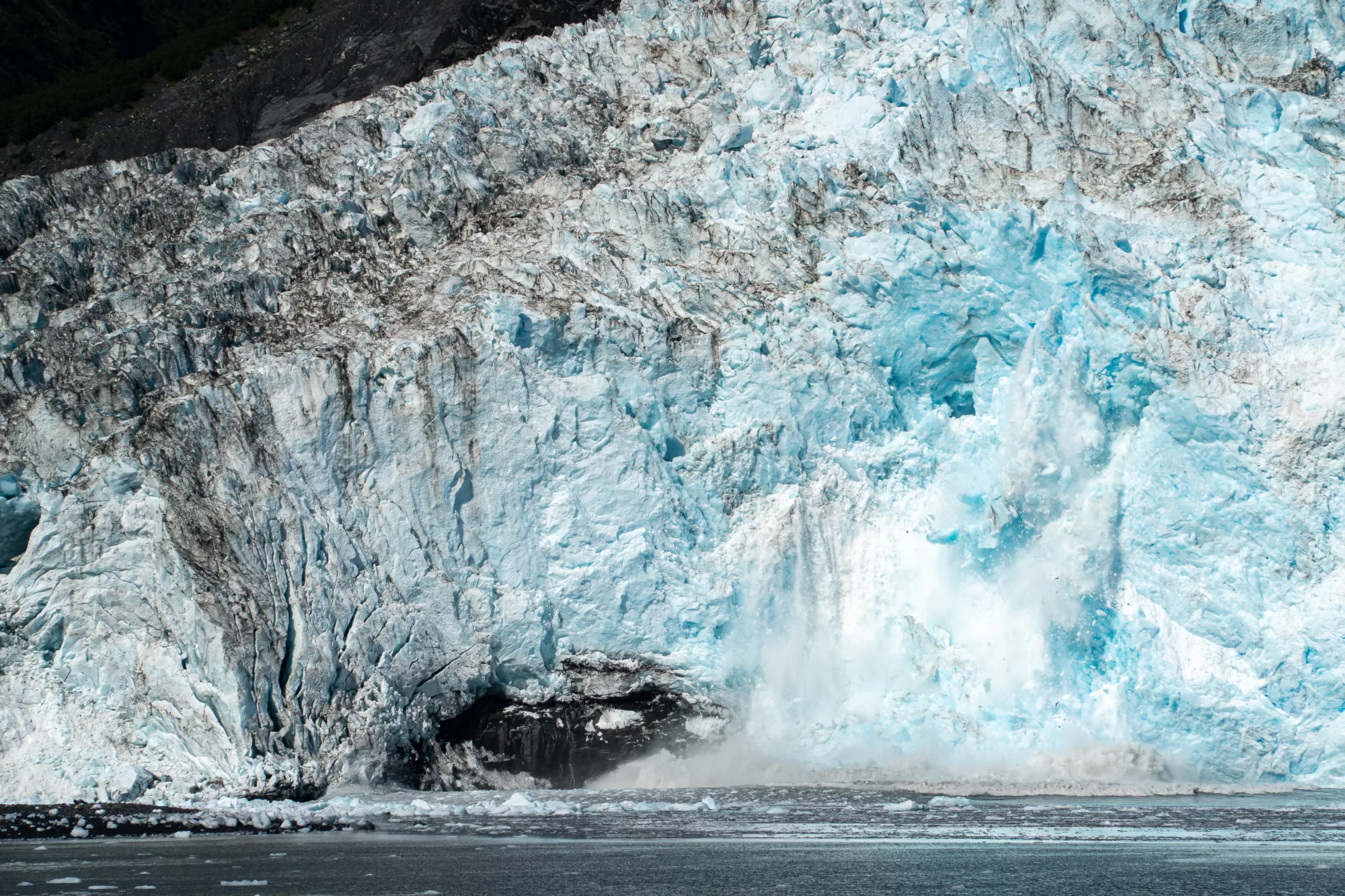 A glacier calves in Kenai Fjords National Park, Alaska.